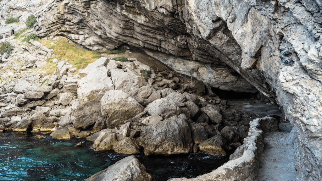 Natural sea cave beneath limestone cliff along the Golitsyn Trail in Crimea