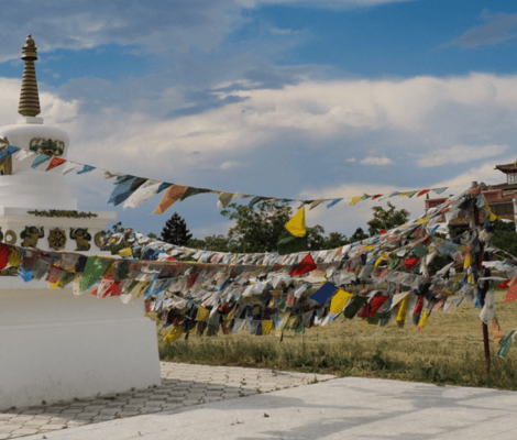 A buddhist temple, stupa and tibetan flags in Kalmykia, Russia