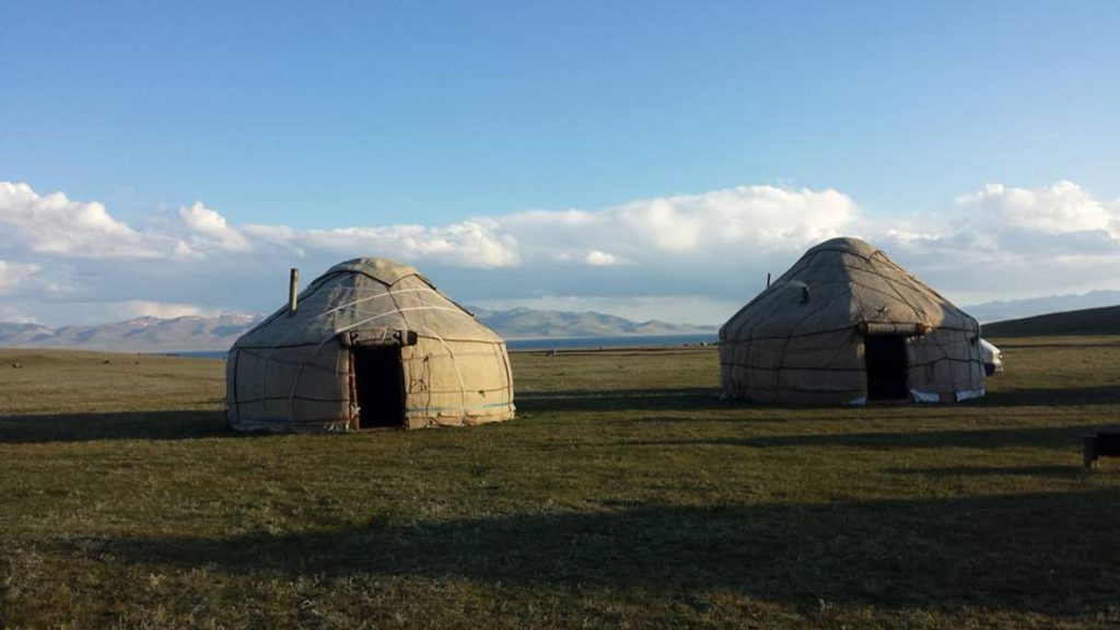 Traditional yurts in the Kyrgyz steppe near the mountains in Central Asia during a trip across the former Soviet world