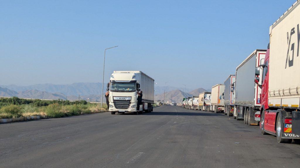 Men getting a lift on a truck across the no-man's-land between Nakhchivan and Turkey