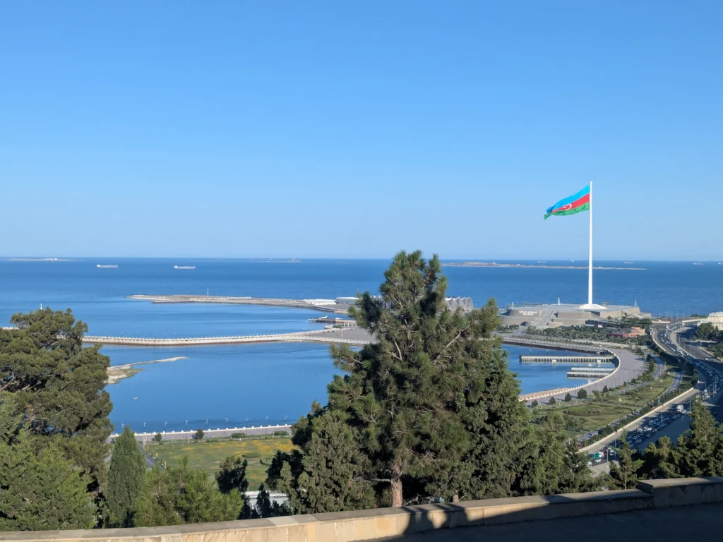 Giant Azerbaijan flag overlooking the Caspian Sea from Highland Park in Baku
