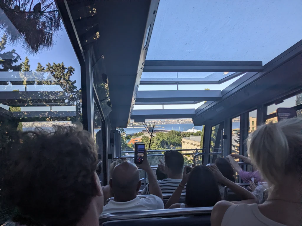 Passengers riding the Baku Funicular towards Highland Park