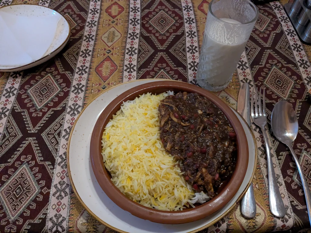 Fisinjan plov served with saffron rice at Nergiz Restaurant in Baku