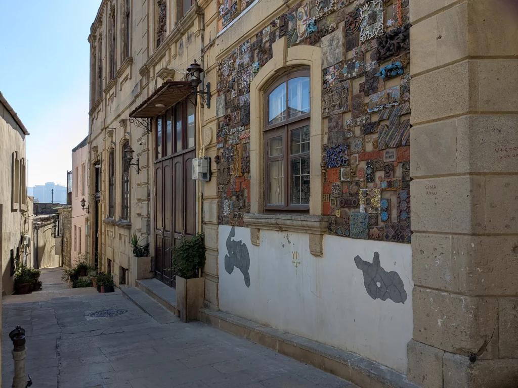 Narrow historic street with traditional buildings in Icherisheher