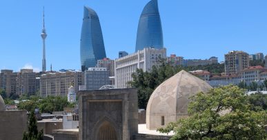 Shirvanshah Palace with Baku Flame Towers in the background