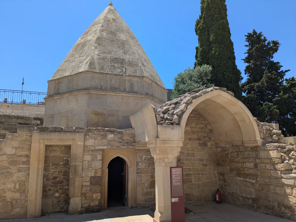 Stone mausoleum and historic courtyard at Shirvanshah Palace in Baku