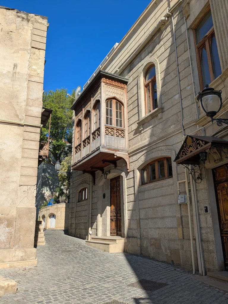 Traditional stone house and wooden balcony in Baku Old City